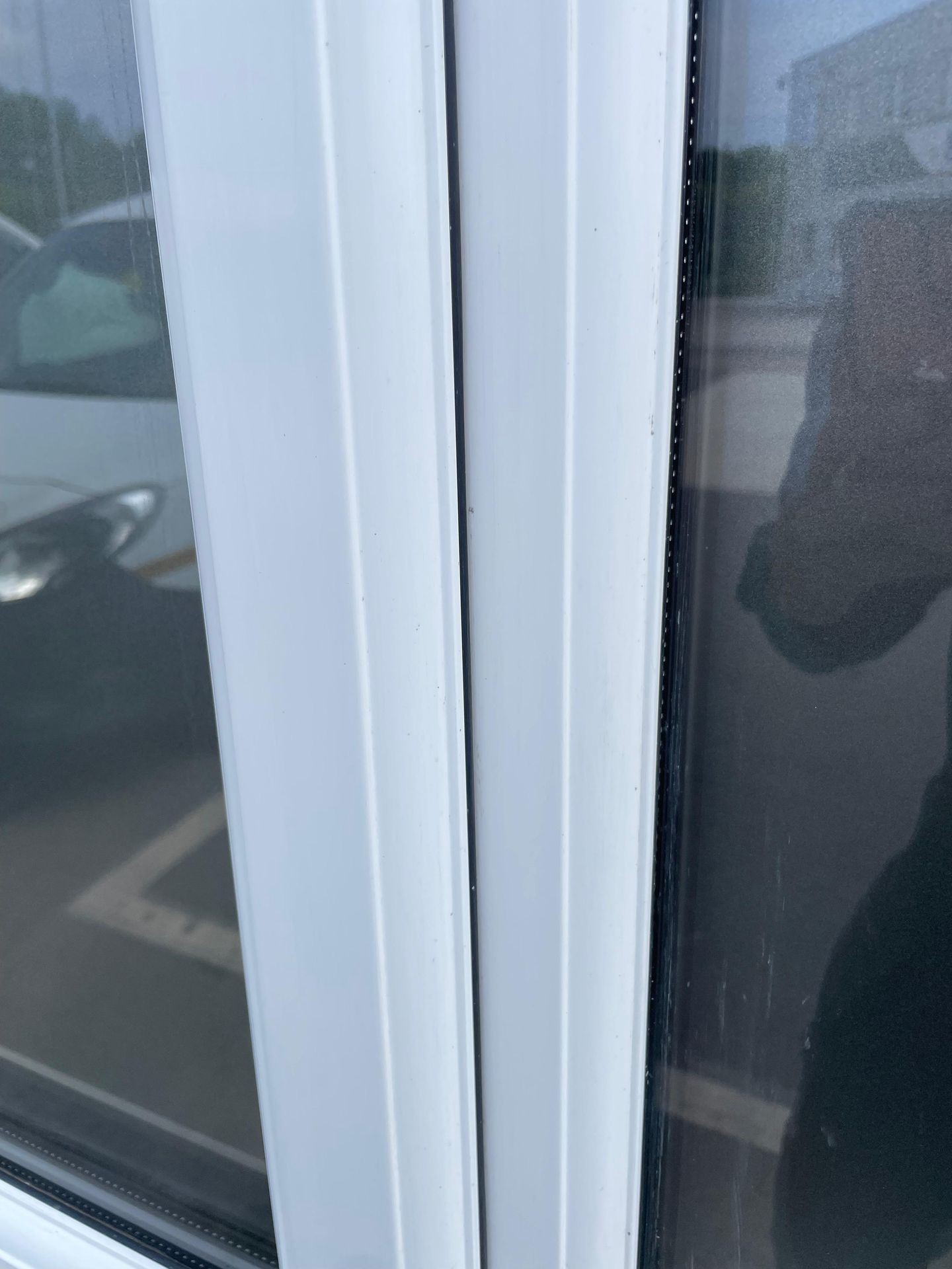 Clean window frame as part of window cleaning services