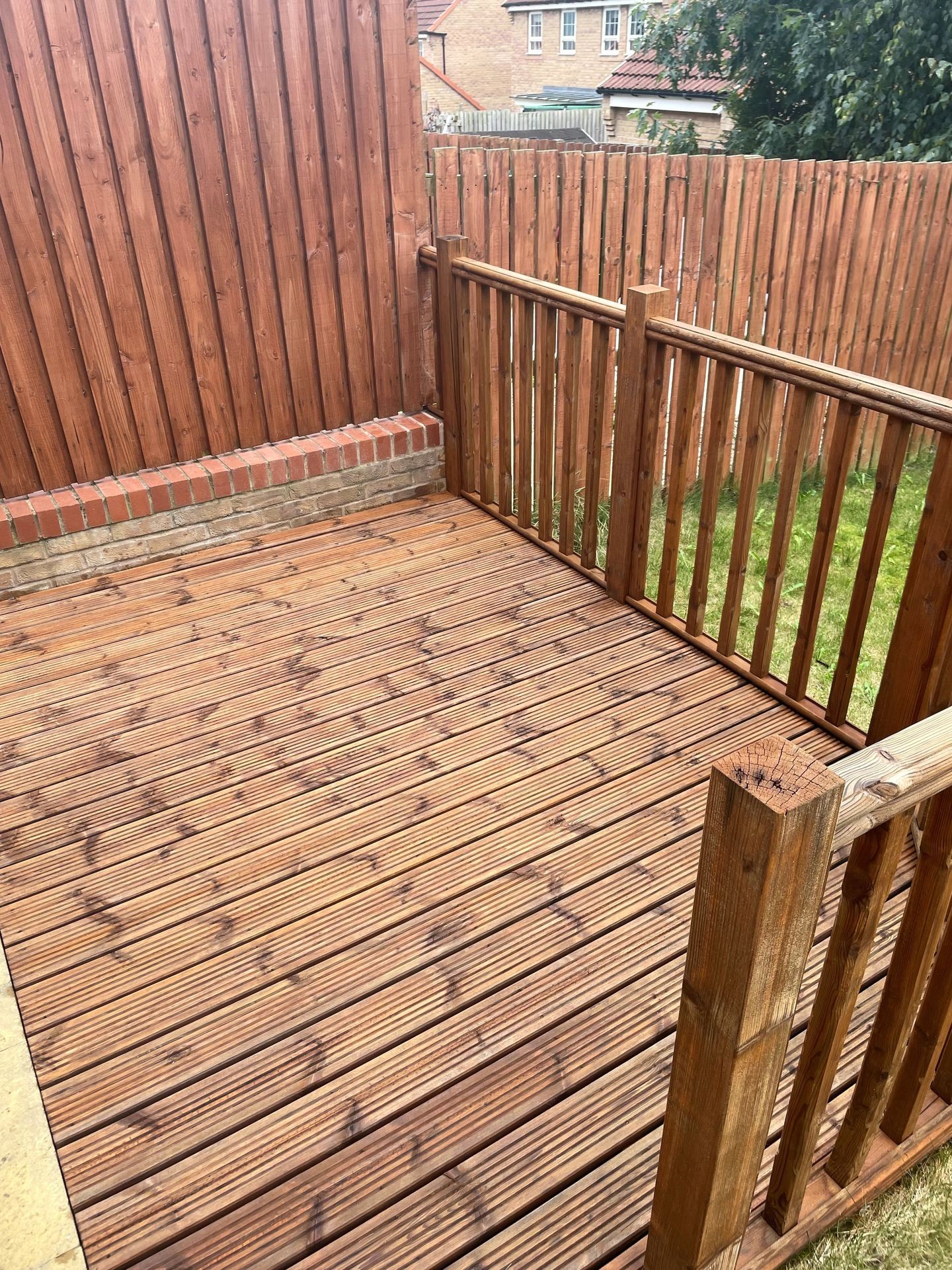 Timber decking which has recently been cleaned and sealed