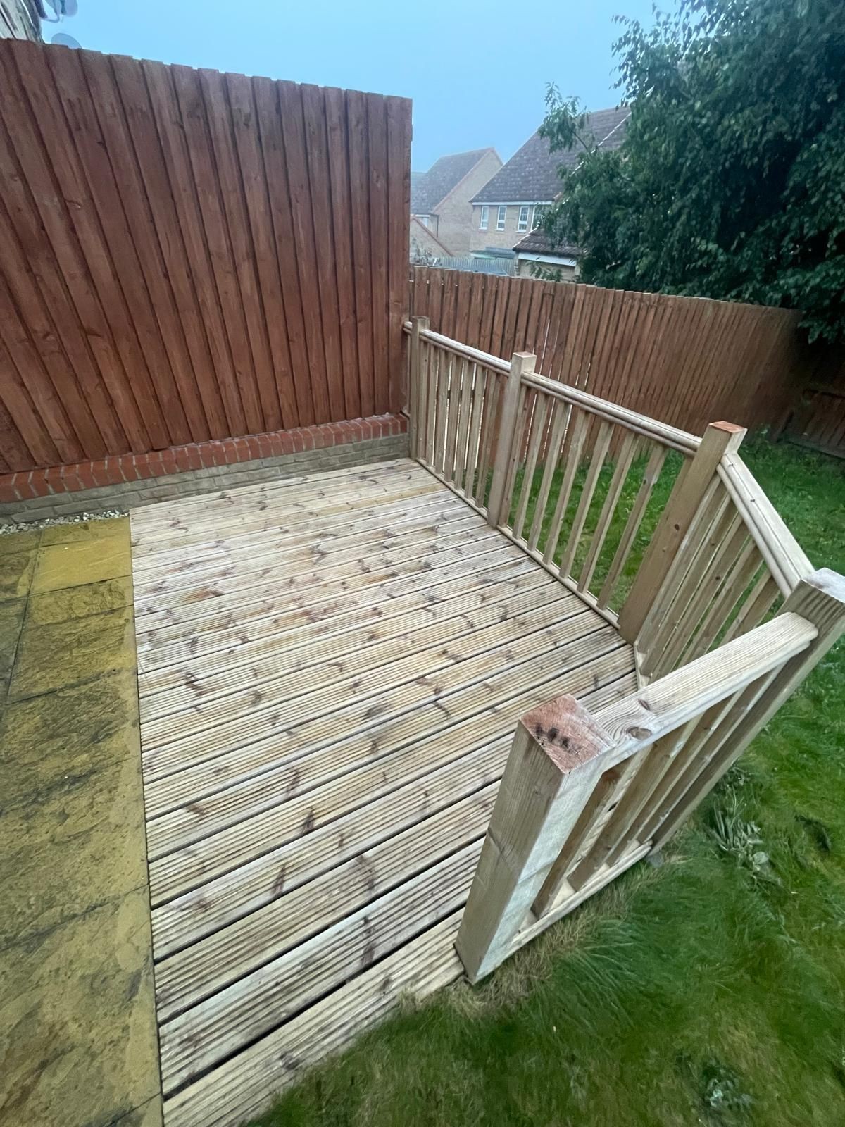 Cleaned timber decking with visible natural wood grain, showcasing a refreshed and restored appearance