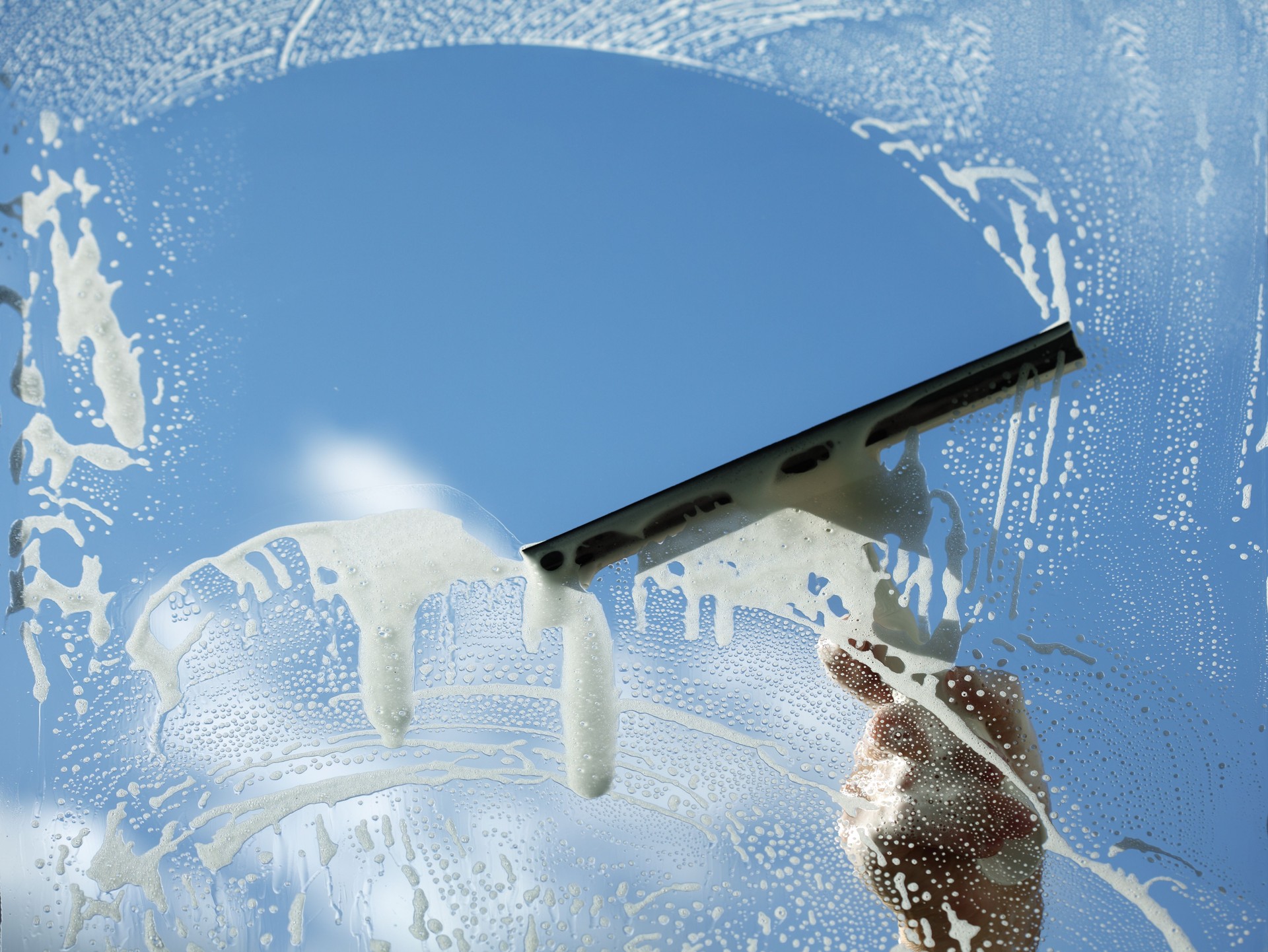 Squeegee Cleaning a Window